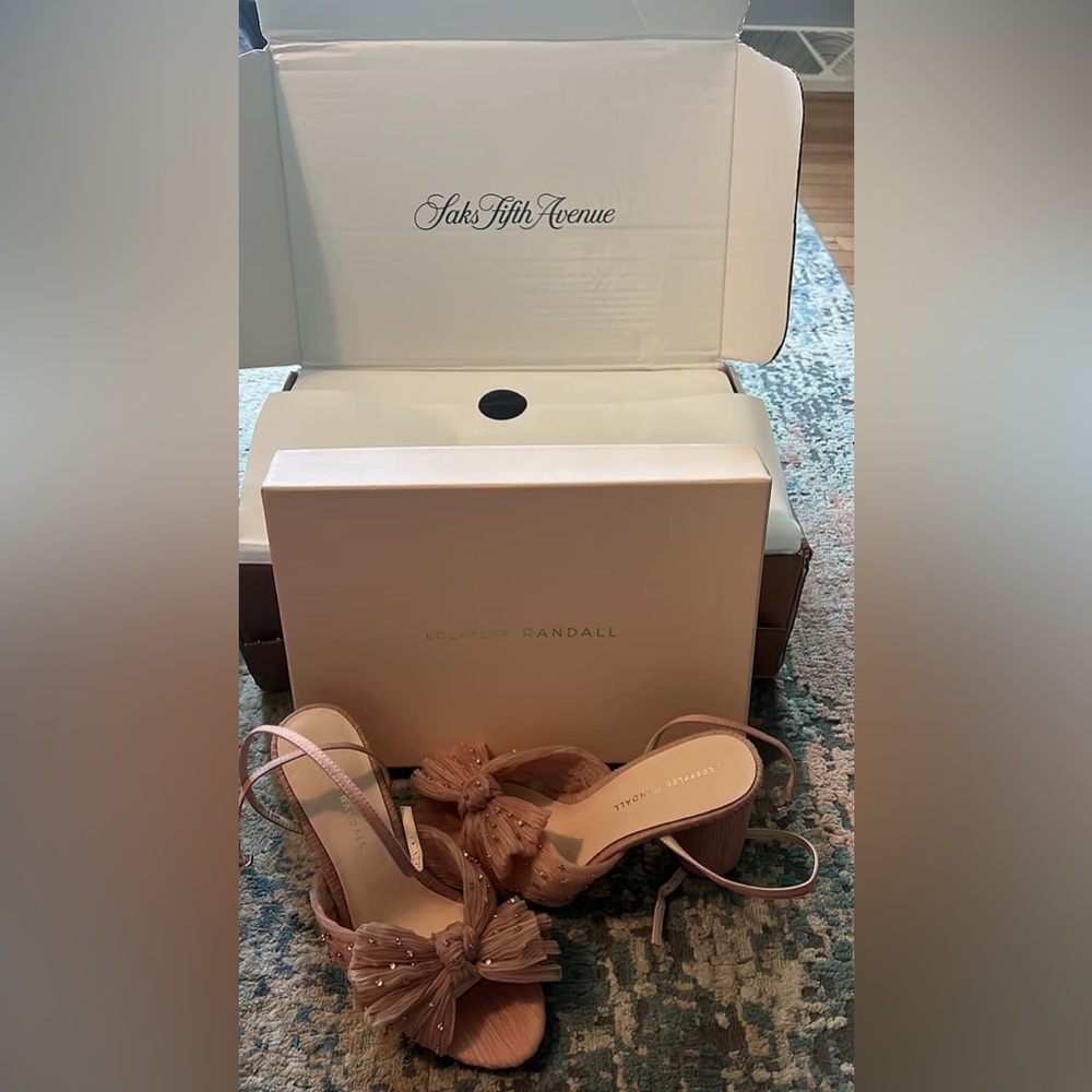 Heels I originally bought for my wedding. Size 8. Brand new.